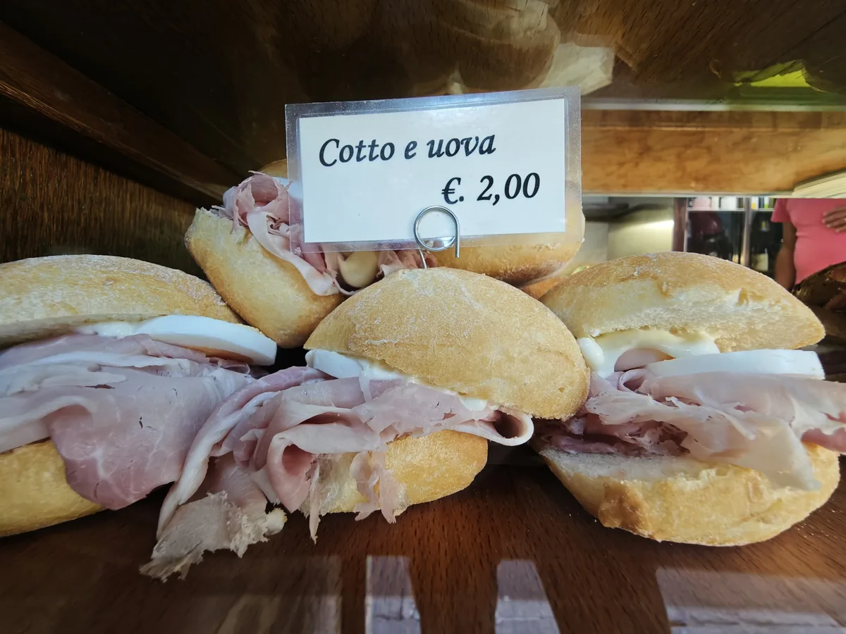 Cicchetto with cooked ham and egg, 2 euro, at the Al Mercà bacaro near the Rialto market in Venice