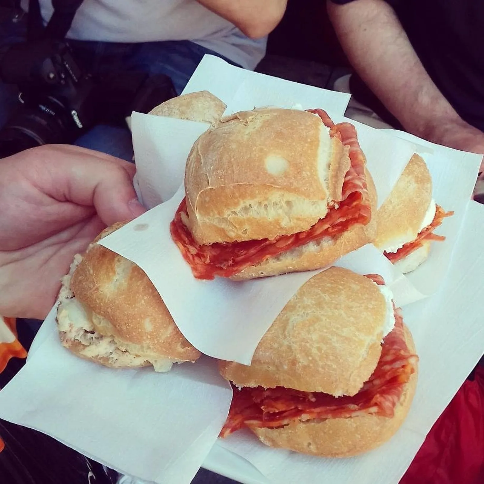 Small filled panini from Al Mercà held in hand on the square at Rialto